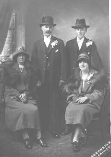 [Photo of wedding group]