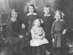 [Photo of 5 children]